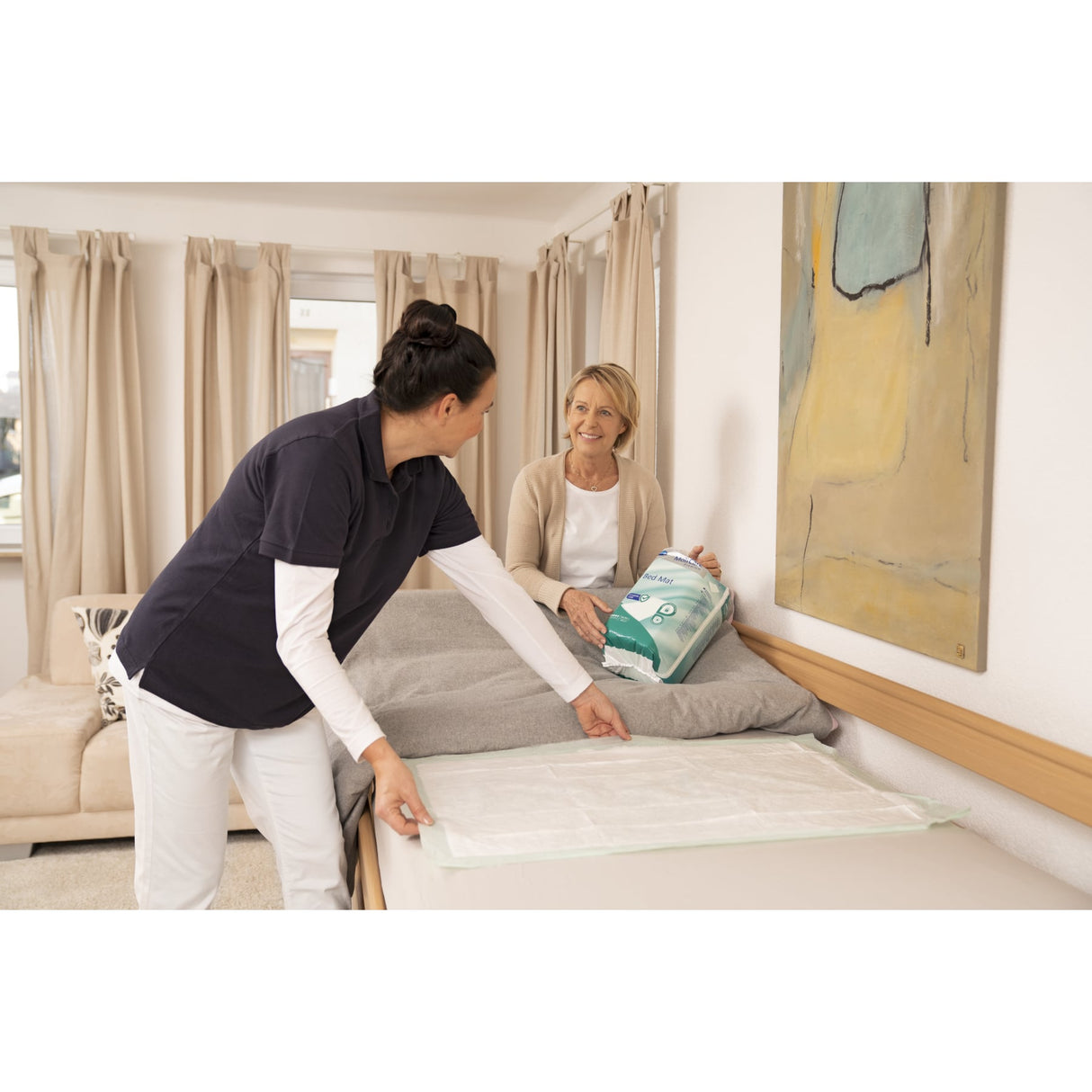 MoliCare Premium Bed Mat 5 Tropfen Krankenunterlage - Anwendung am Bett